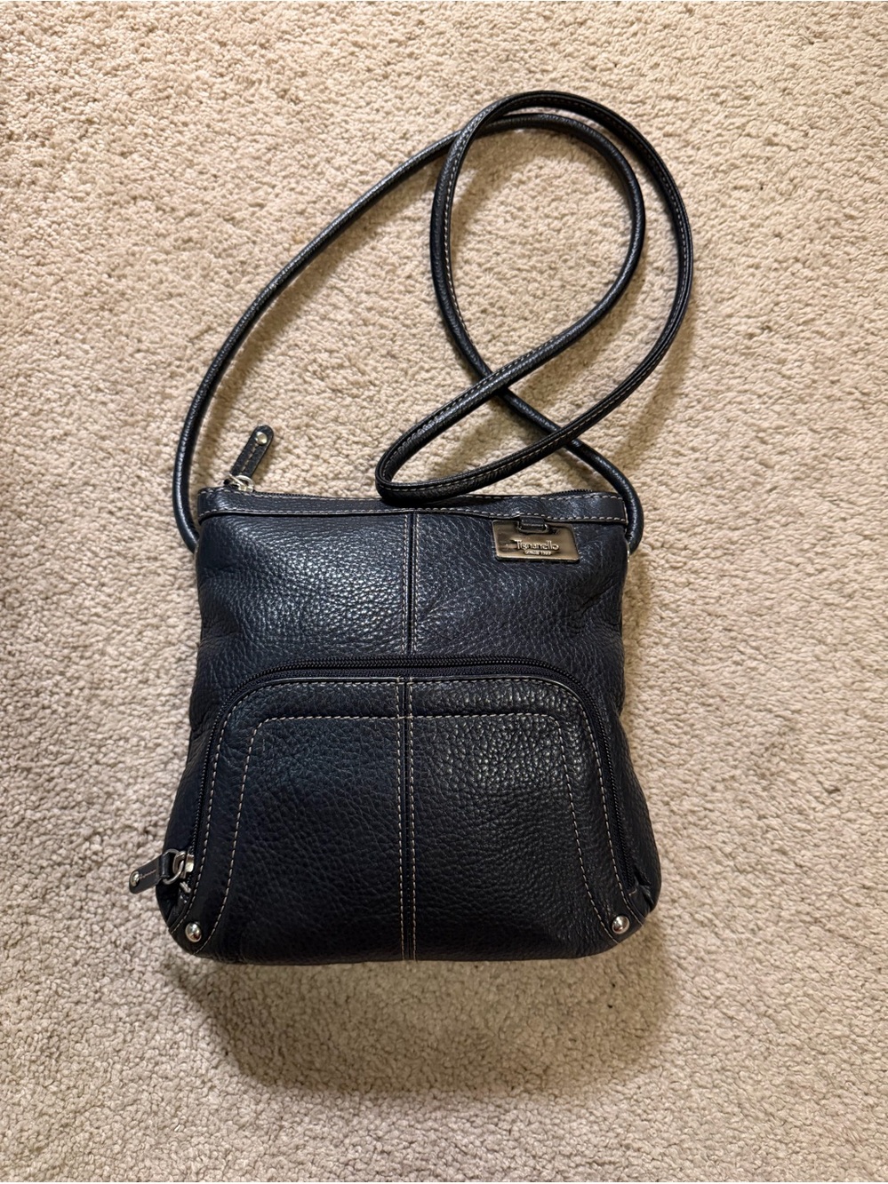 Tignanello Black pebbled leather crossbody bag with silver hardware.